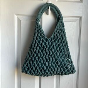 Beautiful blue crocheted style shoulder bag.